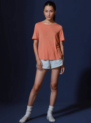 Elevate Your Wardrobe with Our Peach Fluid T-Shirt for Women